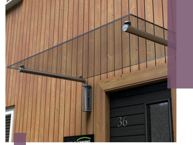 Стеклянные козырьки на входы и фасады в Ухте